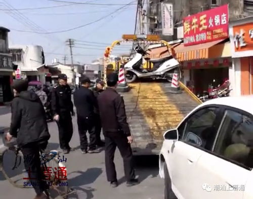 溪頭鎮(zhèn)春節(jié)期間交通嚴管 車站至鎮(zhèn)政府路段違章停車一律拖車